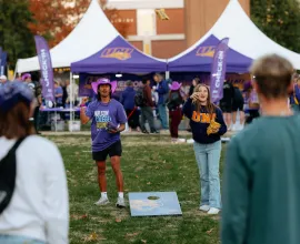 students playing games on campus for homecoming